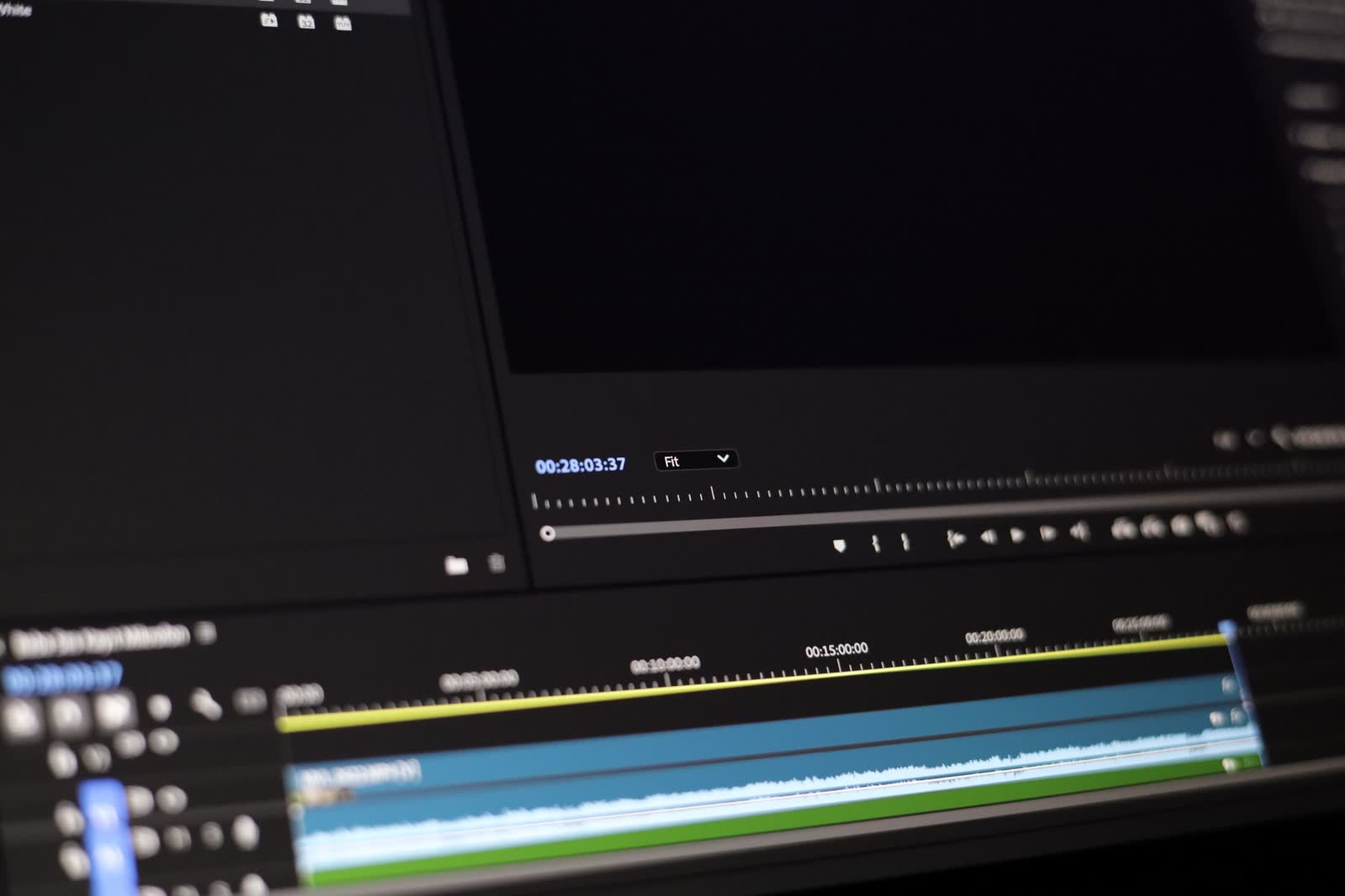 A video edit timeline with layered clips and an audio waveform.
